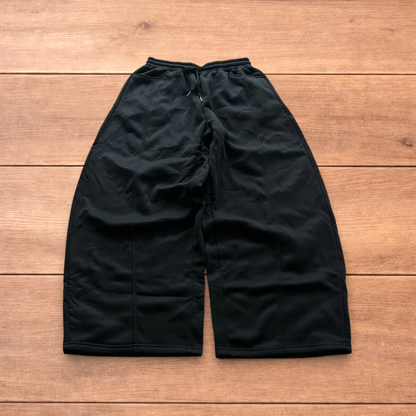 Super baggy wide leg Korean joggers in black.