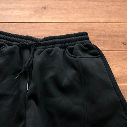 Super baggy wide leg Korean joggers in black.
