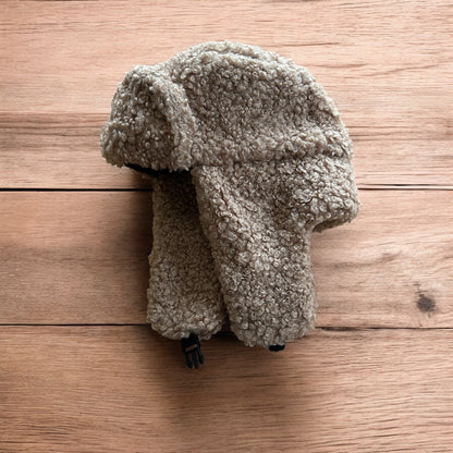 Lovely wool style fluffy Russian ear flap winter hat in brown. One size.