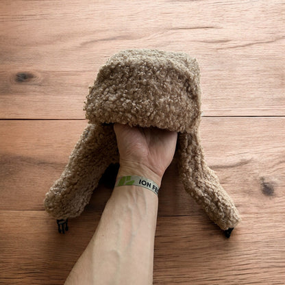 Lovely wool style fluffy Russian ear flap winter hat in brown. One size.
