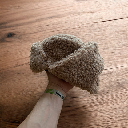 Lovely wool style fluffy Russian ear flap winter hat in brown. One size.