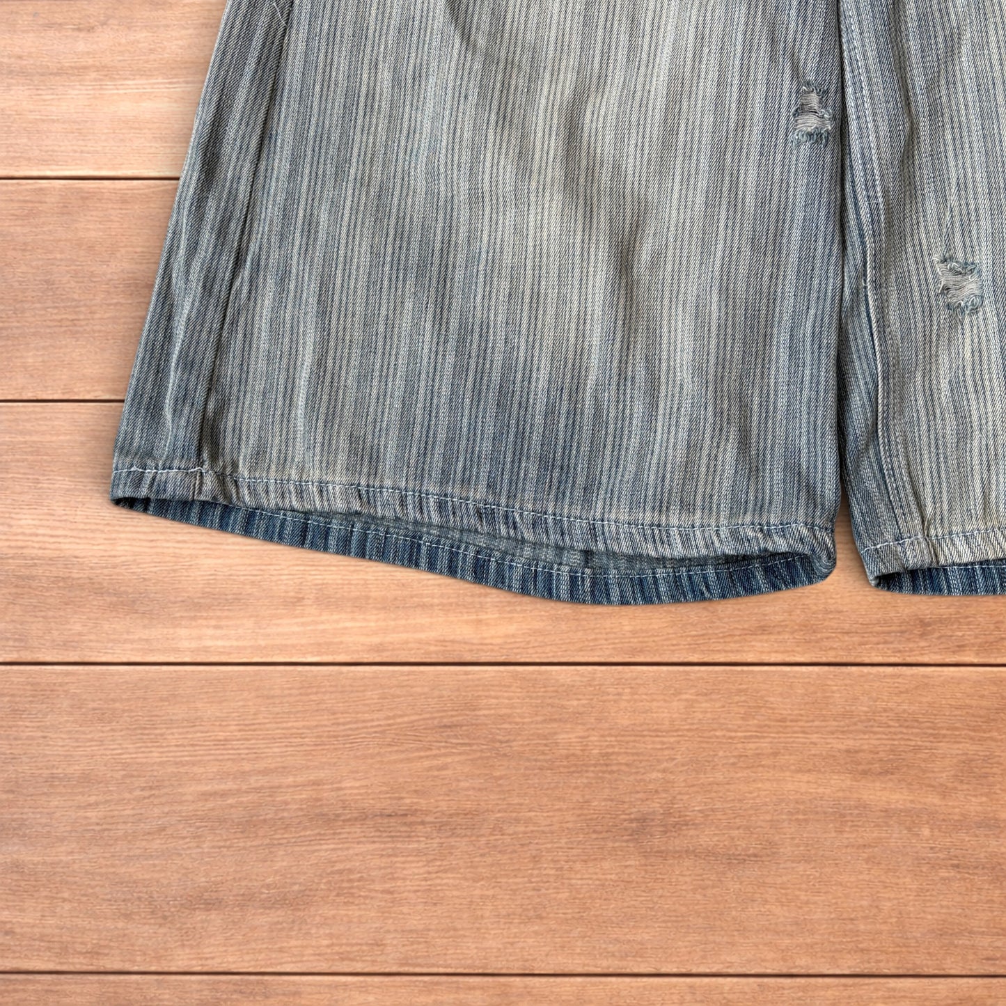 Super baggy wide leg striped denim shorts jorts in light blue.