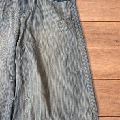 Super baggy wide leg striped denim shorts jorts in light blue.