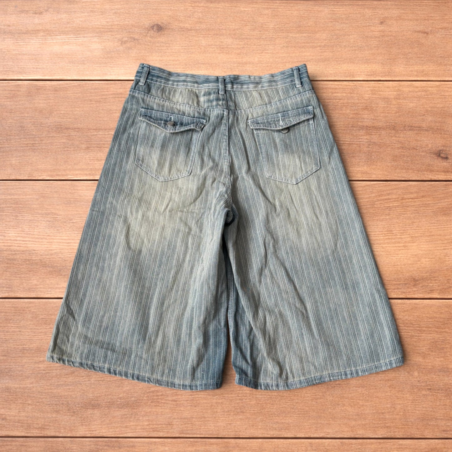 Super baggy wide leg striped denim shorts jorts in light blue.