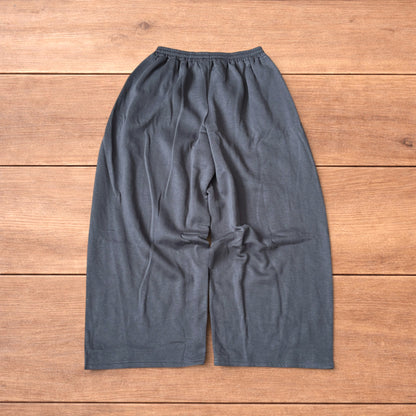 Super baggy wide leg Korean joggers with side stripes in dark grey.