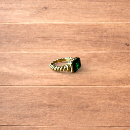 Lovely vintage style gold ring with green gemstone.