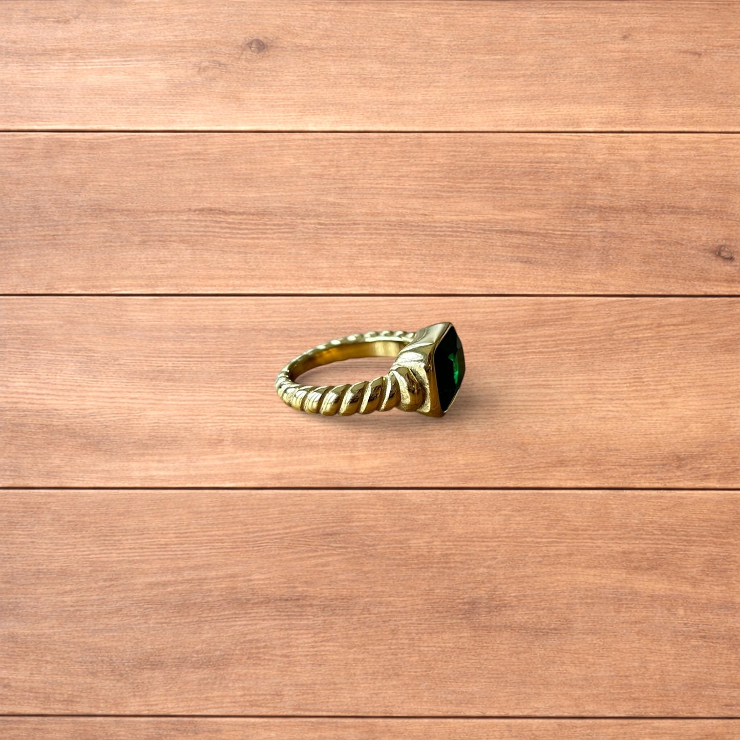 Lovely vintage style gold ring with green gemstone.