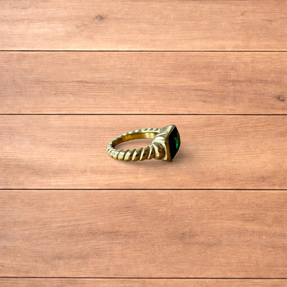 Lovely vintage style gold ring with green gemstone.