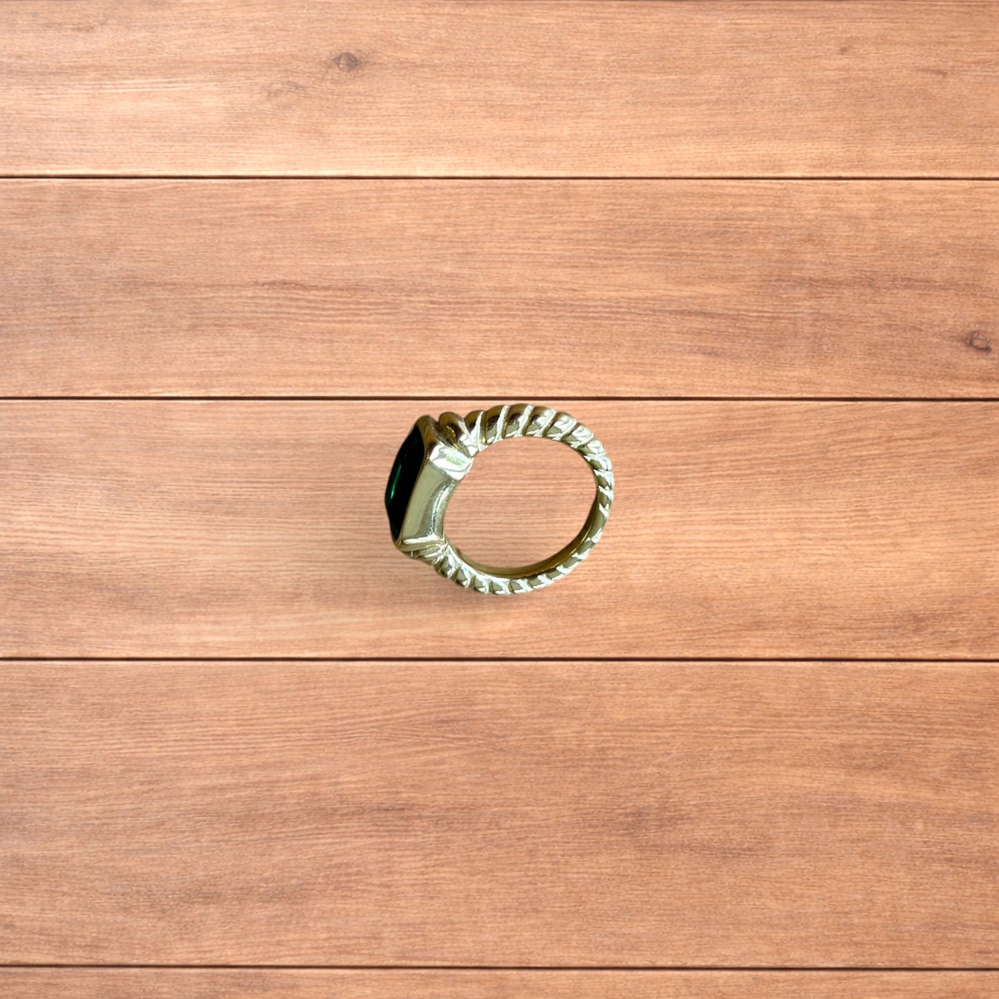 Lovely vintage style gold ring with green gemstone.