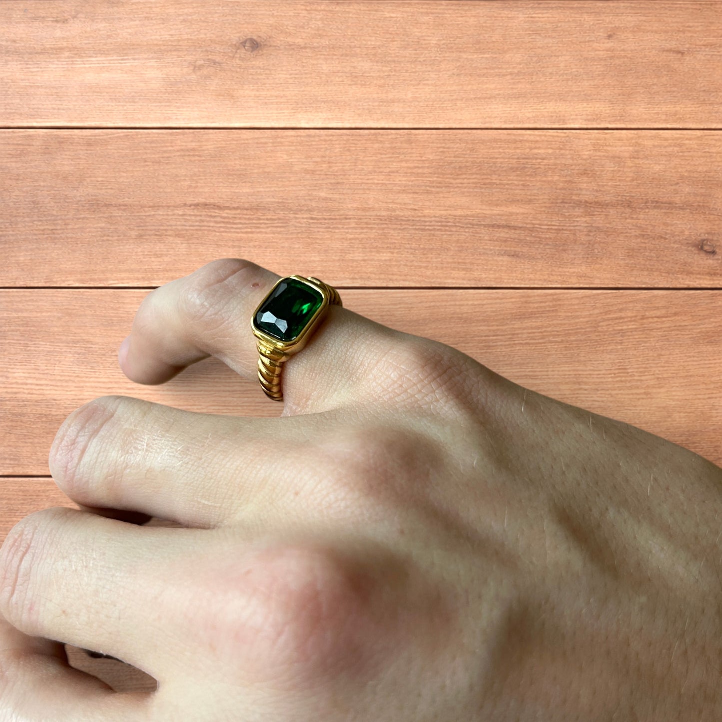 Lovely vintage style gold ring with green gemstone.