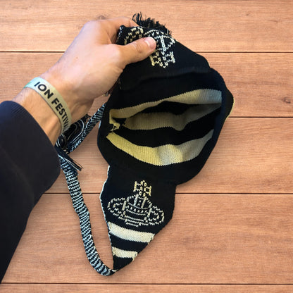 Lovely vintage style Dappy ear flap bobble hat in black/beige stripes.