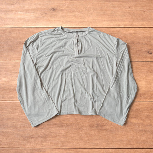Relaxed fit Henley long sleeve top tshirt in beige.