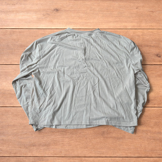 Relaxed fit Henley long sleeve top tshirt in beige.