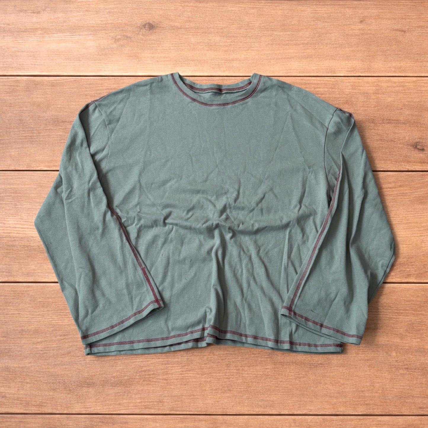 Vintage style relaxed fit long sleeve top tshirt in teal blue.