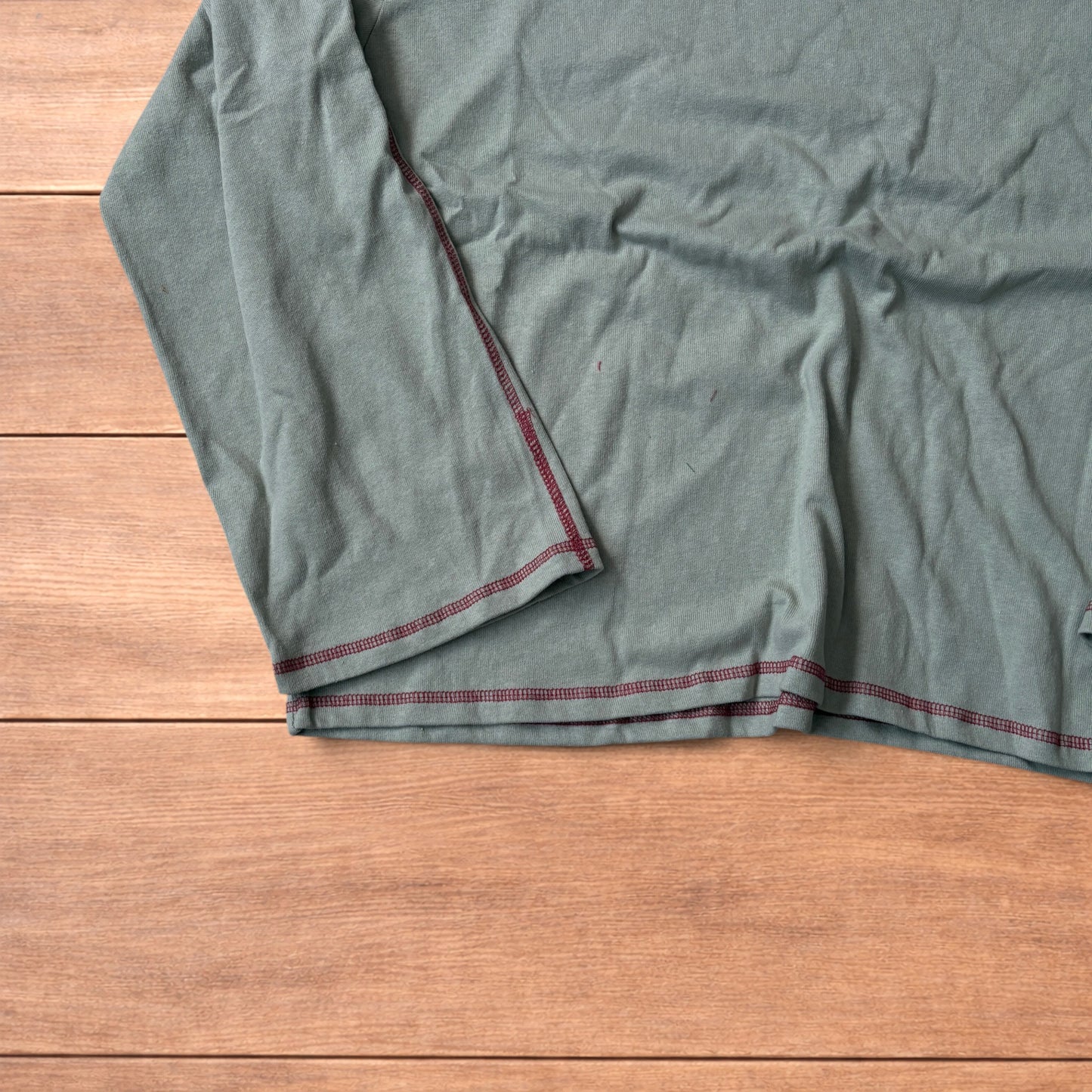 Vintage style relaxed fit long sleeve top tshirt in teal blue.