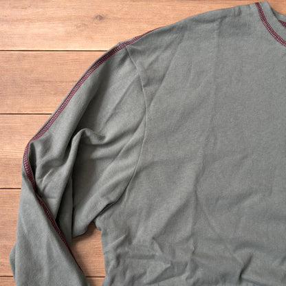 Vintage style relaxed fit long sleeve top tshirt in teal blue.