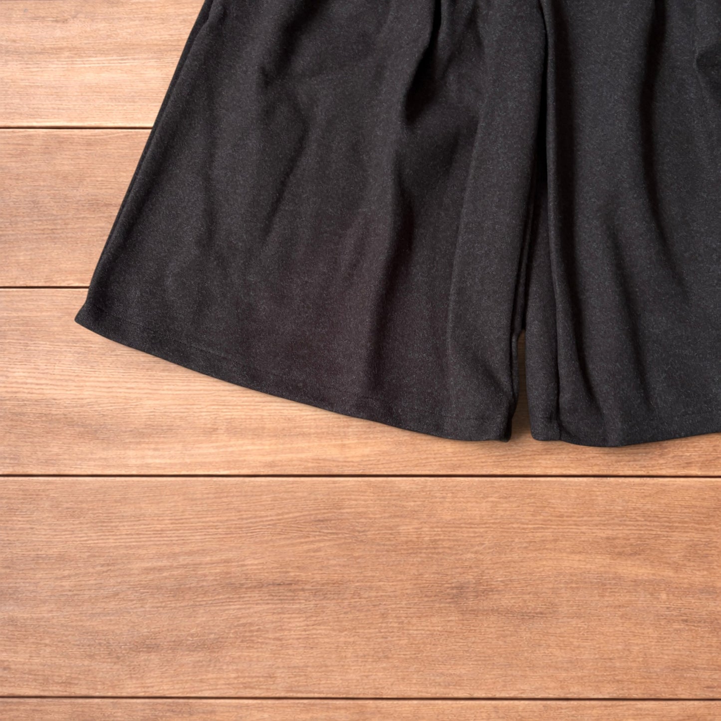 Vintage style baggy wide leg long tailored wool shorts in brown.