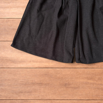 Vintage style baggy wide leg long tailored wool shorts in brown.