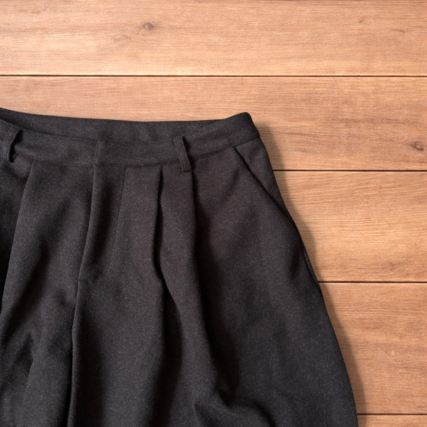 Vintage style baggy wide leg long tailored wool shorts in brown.