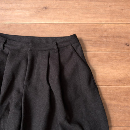 Vintage style baggy wide leg long tailored wool shorts in brown.