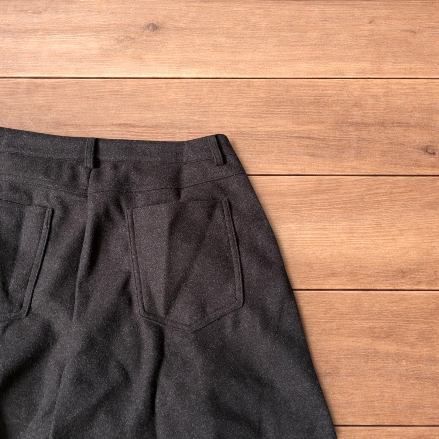 Vintage style baggy wide leg long tailored wool shorts in brown.