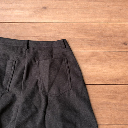 Vintage style baggy wide leg long tailored wool shorts in brown.