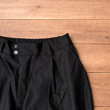 Vintage style baggy wide leg tailored wool trousers in brown.