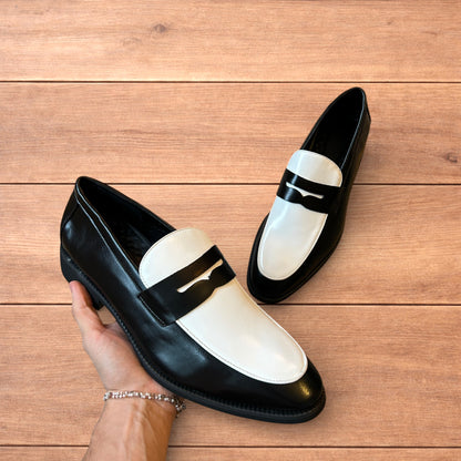 Lovely classic style penny loafers shoes in black and white design.