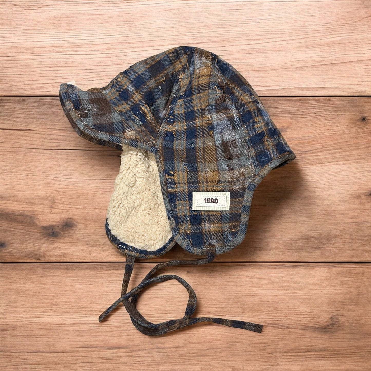 Vintage style trapper fluffy ear flap checkered hat cap in navy/brown One size.