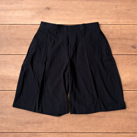 Super baggy wide tailored pleated linen shorts jorts in black.
