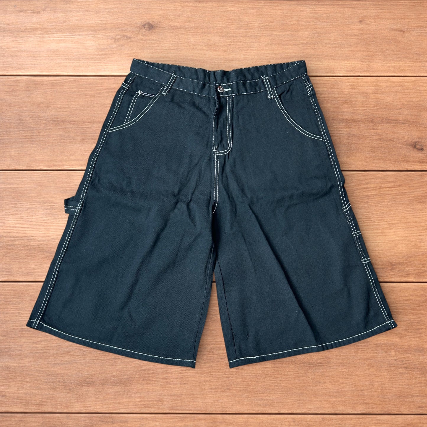 Insane super baggy long skater jean shorts jorts in black with embroidered design.