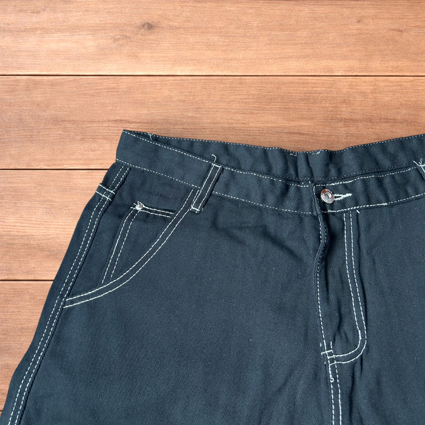 Insane super baggy long skater jean shorts jorts in black with embroidered design.