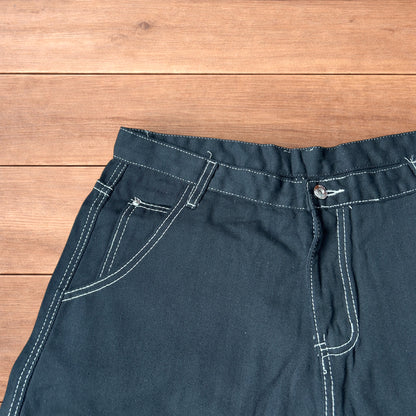 Insane super baggy long skater jean shorts jorts in black with embroidered design.