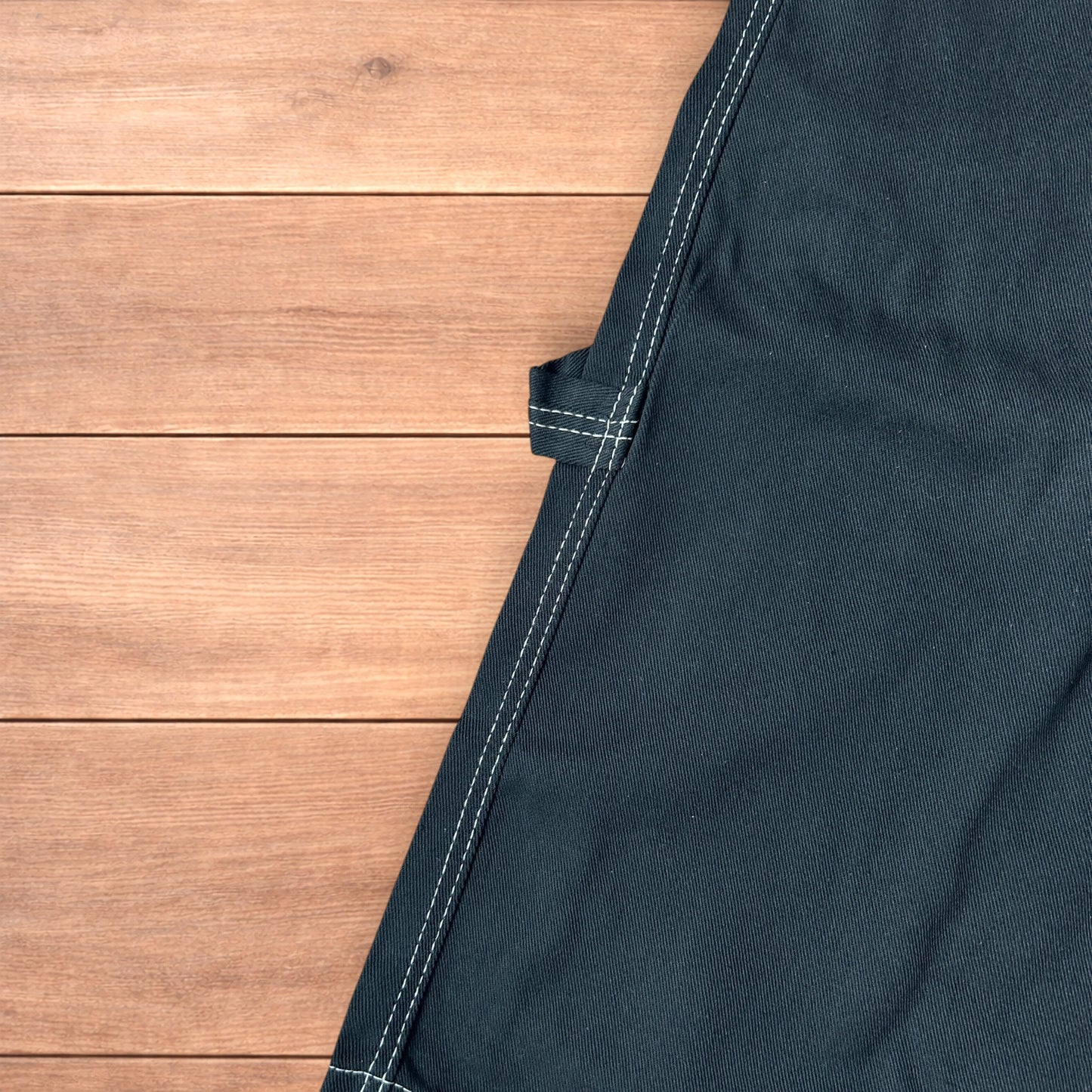 Insane super baggy long skater jean shorts jorts in black with embroidered design.