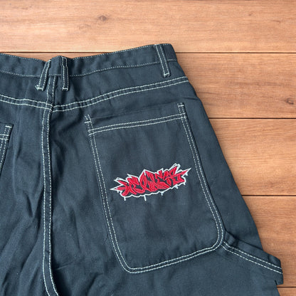 Insane super baggy long skater jean shorts jorts in black with embroidered design.