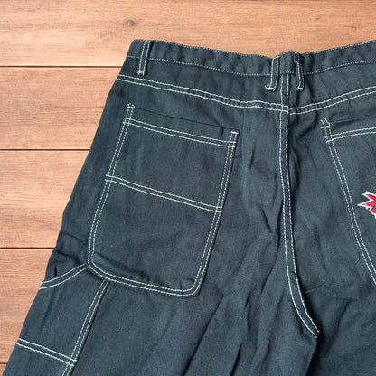 Insane super baggy long skater jean shorts jorts in black with embroidered design.