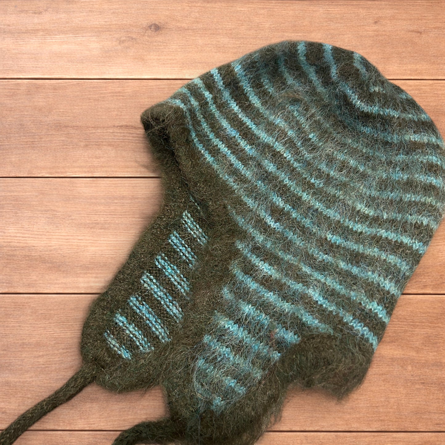 Lovely vintage style knitted ear flap hat bonnet in green/brown stripes.
