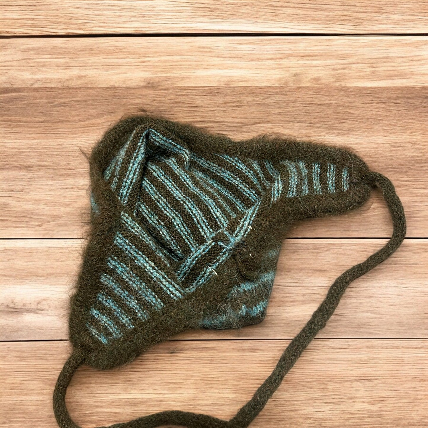 Lovely vintage style knitted ear flap hat bonnet in green/brown stripes. One size.