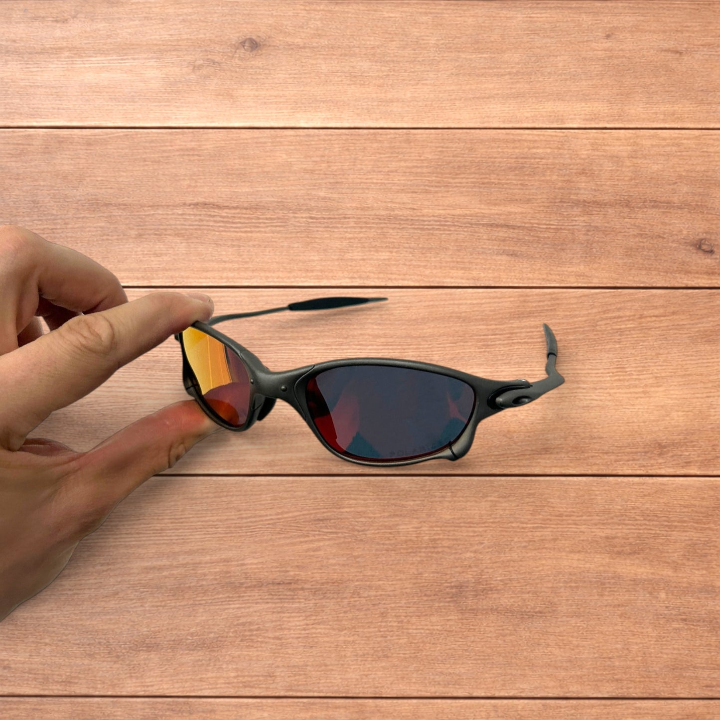 Insane metal frame polarised sunglasses in black frame red lense.