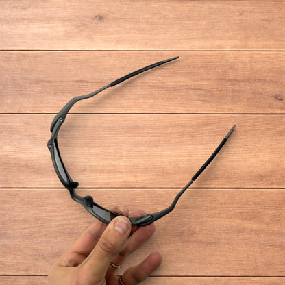 Insane metal frame polarised sunglasses in black frame red lense.
