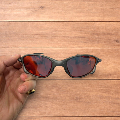 Insane metal frame polarised sunglasses in black frame red lense.