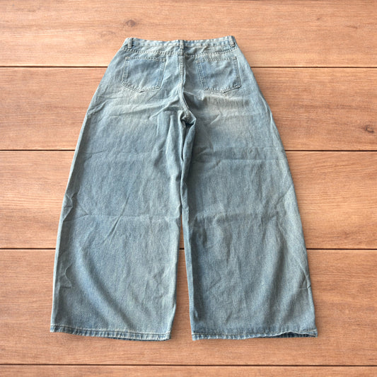 Vintage style baggy wide leg skater fit jeans in light blue.