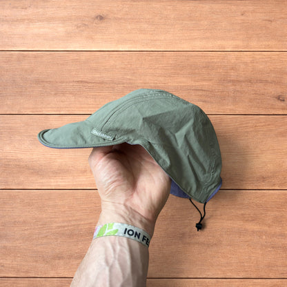 Lightweight reversible military pilot trapper hat in green/purple.
