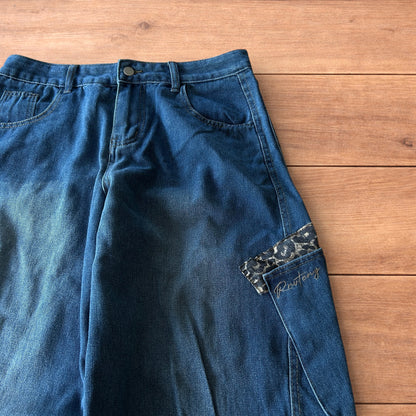 Incredible vintage style baggy wide leg skater fit jeans with leopard print in mid blue.