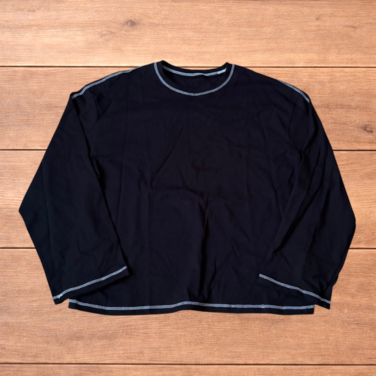 Vintage style relaxed fit long sleeve top tshirt in black.