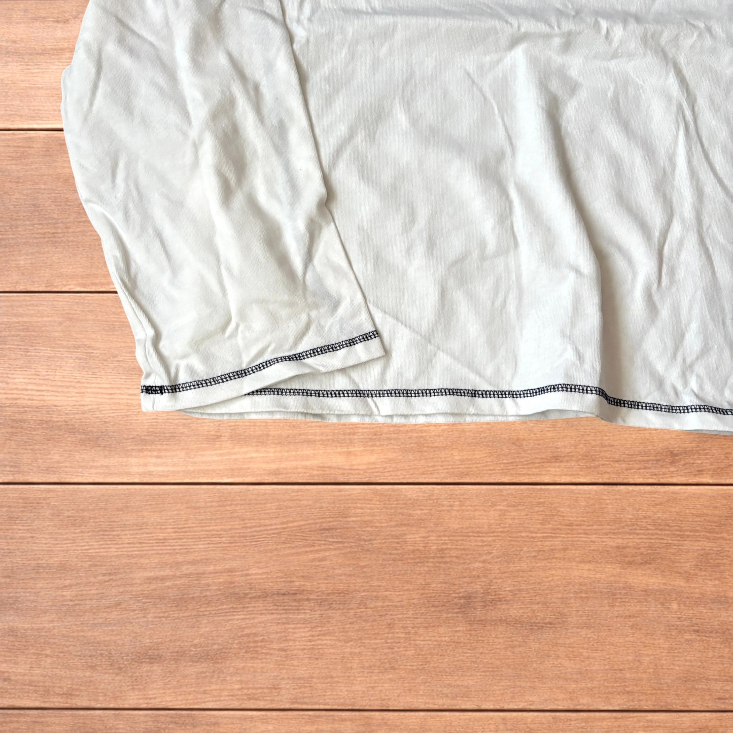 Vintage style relaxed fit long sleeve top tshirt in white.