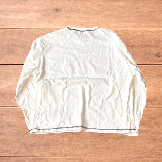Vintage style relaxed fit long sleeve top tshirt in white.