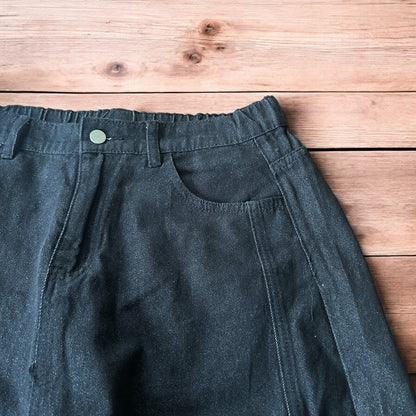 Super baggy raw denim style skater fit jeans in washed black.