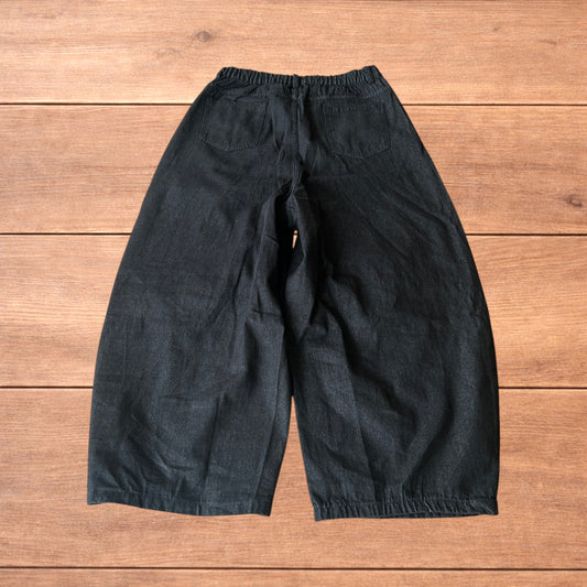 Super baggy raw denim style skater fit jeans in washed black.