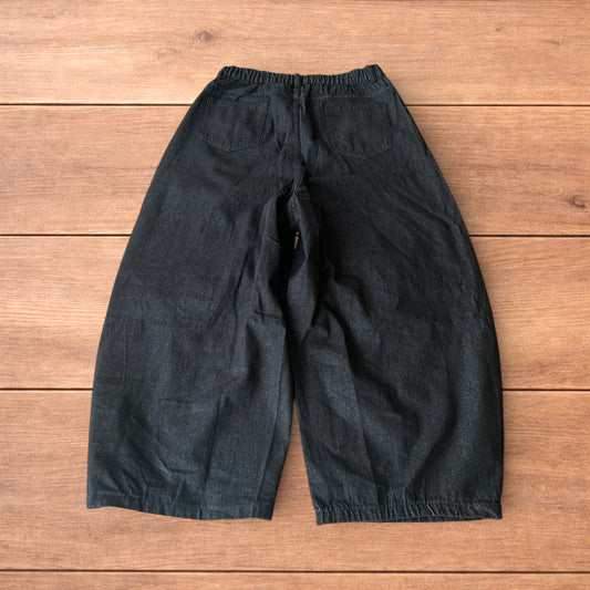 Super baggy raw denim style skater fit jeans in washed black.